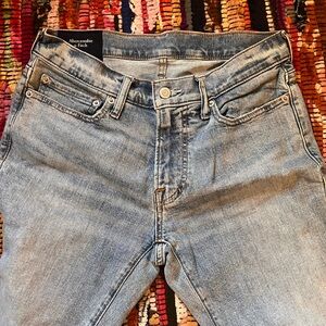 Abercrombie and Fitch ripped blue jeans